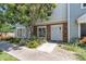 Inviting townhouse featuring well-manicured landscaping and a cozy, brick-accented front entrance at 1601 N Saba St # 308, Chandler, AZ 85225