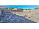 Backyard featuring a perimeter brick border, a privacy wall and ready for creative landscaping at 16112 W Durango St, Goodyear, AZ 85338