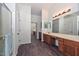 Spacious bathroom with dual sinks, and private toilet room at 16112 W Durango St, Goodyear, AZ 85338