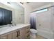 Bathroom with a vanity, new sink, and a shower-tub combo at 16112 W Durango St, Goodyear, AZ 85338