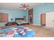 Spacious bedroom featuring two beds, lots of natural light, and room for creativity at 16112 W Durango St, Goodyear, AZ 85338