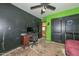 Bedroom with a desk, closet, and ceiling fan, offering a versatile and customizable space at 16112 W Durango St, Goodyear, AZ 85338