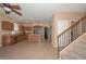 Well-equipped kitchen featuring an island, wood cabinetry, and stainless steel appliances at 16112 W Durango St, Goodyear, AZ 85338