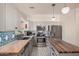 Bright kitchen featuring stainless steel appliances, butcher block countertops, and a patterned tile backsplash at 16153 W Lisbon Ln, Surprise, AZ 85379