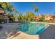 Relax and unwind by the sparkling community pool, surrounded by swaying palm trees at 1633 E Lakeside Dr # 39, Gilbert, AZ 85234