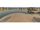 Community dock with boat and waterfront access, offering serene lake views at 1633 E Lakeside Dr # 39, Gilbert, AZ 85234