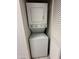 Convenient stacked washer and dryer unit for efficient laundry space at 1633 E Lakeside Dr # 39, Gilbert, AZ 85234