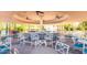 Outdoor bar with seating and lush landscaping near the lake at 1633 E Lakeside Dr # 39, Gilbert, AZ 85234