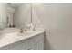 Bright bathroom featuring a single vanity sink, faucet, and plenty of counter space at 19820 N 13Th Ave # 255, Phoenix, AZ 85027