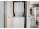 Laundry area featuring a stacked washer and dryer set at 19820 N 13Th Ave # 255, Phoenix, AZ 85027