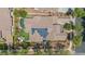 Aerial view of the house showing the swimming pool, lawn, desert landscaping and solar panels at 21014 W Cora Vista --, Buckeye, AZ 85396