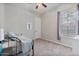 Simple bedroom with neutral walls, one window with a curtain, and carpeted flooring at 21014 W Cora Vista --, Buckeye, AZ 85396