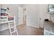Bedroom with a ladder to a bunk bed and gray dresser with decor shelves at 21014 W Cora Vista --, Buckeye, AZ 85396