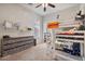 Comfortable carpeted bedroom with bunk bed, storage shelf, and dresser at 21014 W Cora Vista --, Buckeye, AZ 85396