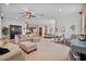 Open-concept living room seamlessly connects to the kitchen and dining area, perfect for modern living and entertaining at 21014 W Cora Vista --, Buckeye, AZ 85396