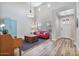Bright living room featuring high ceilings, hardwood floors, and abundant natural light at 21014 W Cora Vista --, Buckeye, AZ 85396