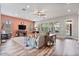Bright living room with wood floors, ceiling fan, and ample natural light, creating a welcoming atmosphere at 21014 W Cora Vista --, Buckeye, AZ 85396