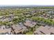 Lush neighborhood showcasing mountain views, desert landscaping, and houses with solar panels at 21014 W Cora Vista --, Buckeye, AZ 85396