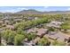 Scenic neighborhood view showcasing tree-lined streets and residences with mountain views at 21014 W Cora Vista --, Buckeye, AZ 85396