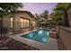 Backyard pool with elegant landscape lighting, creating a relaxing ambiance for evening swims at 21014 W Cora Vista --, Buckeye, AZ 85396