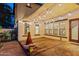 Backyard patio area featuring string lights, creating a cozy and inviting outdoor space for relaxation at 21104 W Sage Hill Rd, Buckeye, AZ 85396