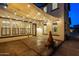 Backyard patio area featuring string lights, creating a cozy and inviting outdoor space for relaxation at 21104 W Sage Hill Rd, Buckeye, AZ 85396
