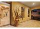 View of entryway with decorative touches and elegant architecture, inviting guests into a stylish home at 21104 W Sage Hill Rd, Buckeye, AZ 85396