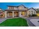 View of property with beautiful landscaping and a covered patio area, enhancing its curb appeal at 21104 W Sage Hill Rd, Buckeye, AZ 85396