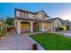 View of property with beautiful landscaping and a covered patio area, enhancing its curb appeal at 21104 W Sage Hill Rd, Buckeye, AZ 85396