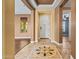 Elegant home foyer with decorative tiled flooring and neutral walls, creating a welcoming entrance at 21104 W Sage Hill Rd, Buckeye, AZ 85396