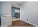 View of an additional room adjacent to the laundry room with a chest freezer at 21104 W Sage Hill Rd, Buckeye, AZ 85396