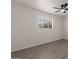 Bright bedroom featuring hardwood flooring and a ceiling fan at 2144 W 1St Pl, Mesa, AZ 85201