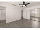Main bedroom suite with ample space, walk-in closet, and ensuite bathroom at 2144 W 1St Pl, Mesa, AZ 85201