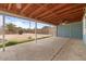 A covered patio overlooks a backyard at 2144 W 1St Pl, Mesa, AZ 85201