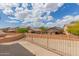 A spacious open-air balcony offering neighborhood views, with a privacy fence at 21972 W Pima St, Buckeye, AZ 85326
