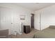 Well-lit bedroom with functional setup, with room to relax and unwind at 21972 W Pima St, Buckeye, AZ 85326