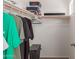 Organized closet with clothing racks, shelves, and ample storage space for organization at 21972 W Pima St, Buckeye, AZ 85326