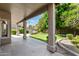 Inviting outdoor patio with stone columns overlooking the landscaped backyard at 236 W Calle Monte Vista Dr, Tempe, AZ 85284