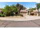 Inviting home featuring mature trees, desert landscaping, a tile roof, and a two-car garage at 236 W Calle Monte Vista Dr, Tempe, AZ 85284