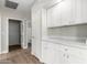 Hallway featuring quartz counters and cabinets at 236 W Calle Monte Vista Dr, Tempe, AZ 85284