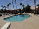 Community pool with lounge chairs and well-maintained landscaping for relaxing at 236 W Calle Monte Vista Dr, Tempe, AZ 85284