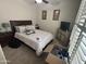 Comfortable bedroom featuring a bed, television, and closet at 2670 S Dragoon Dr, Chandler, AZ 85286