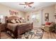 This comfortable bedroom boasts plenty of space, warm light and is well-appointed at 28834 N Spur Dr, San Tan Valley, AZ 85143
