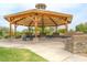 A community picnic area featuring a wooden gazebo and picnic tables, ideal for gatherings at 28834 N Spur Dr, San Tan Valley, AZ 85143
