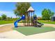 Outdoor playground with slides and climbing frame surrounded by green grass at 28834 N Spur Dr, San Tan Valley, AZ 85143