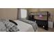 This bedroom features a bunk bed and a single bed, perfect for siblings or sleepovers at 2941 N Oregon St # 12, Chandler, AZ 85225