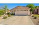 Charming single-story home featuring a well-maintained front yard and attached two-car garage at 3175 E Merrill Ave, Gilbert, AZ 85234