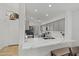 Contemporary kitchen featuring quartz countertops, stainless steel appliances, and ample natural light at 3175 E Merrill Ave, Gilbert, AZ 85234