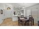 Dining area flows into a modern kitchen with sleek countertops and stainless steel appliances at 3175 E Merrill Ave, Gilbert, AZ 85234
