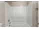 This bathroom features a shower-tub combo with a white surround at 3796 E Rakestraw Ln, Gilbert, AZ 85298